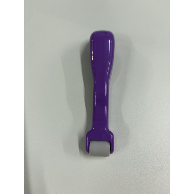 Rouleau presseur de couture violet