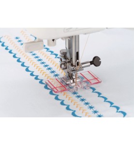 Pied points satin avec guide lignes ELNA 9 mm réf 202084206