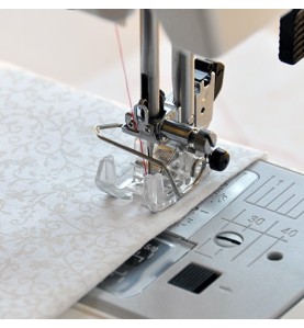 Pied zigzag transparent avec protège-doigts ELNA 7 mm réf 749522005